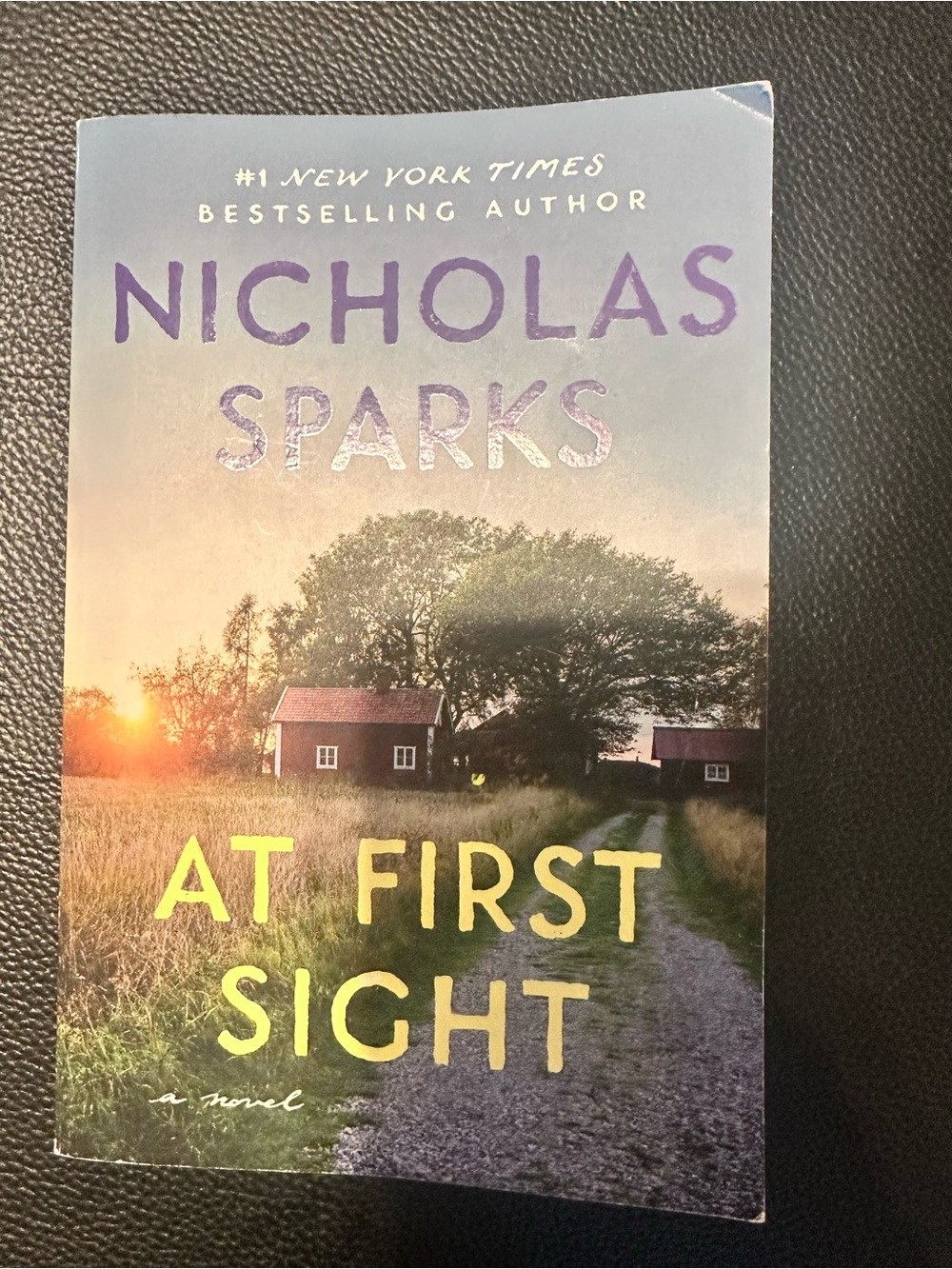 Nicholas Sparks — At First Sight Paperback in Purple & Yellow